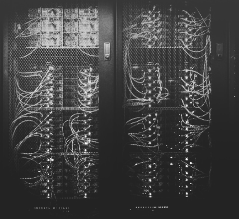 Data center server racks powering building-wide dashboards
